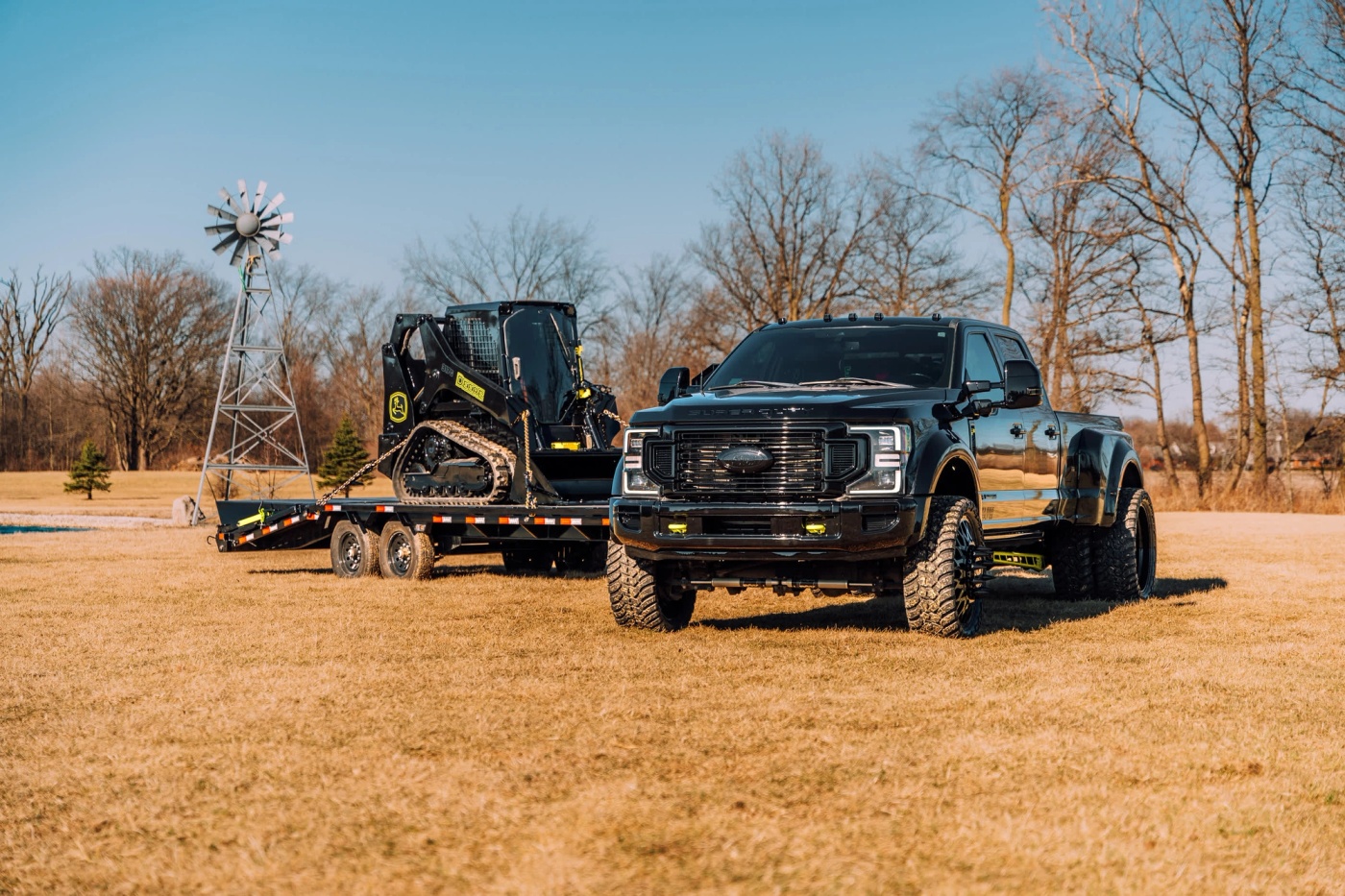2022 Ford F450, 25' Load Trail Gooseneck, John Deere 317G Skid Steer & 20k Cash