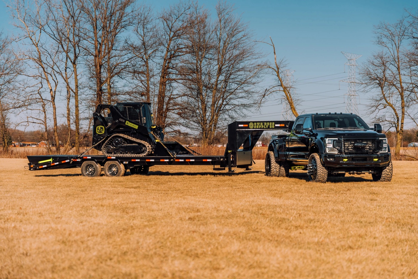 2022 Ford F450, 25' Load Trail Gooseneck, John Deere 317G Skid Steer & 20k Cash